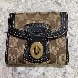 Coach Signature turnbuckle wallet